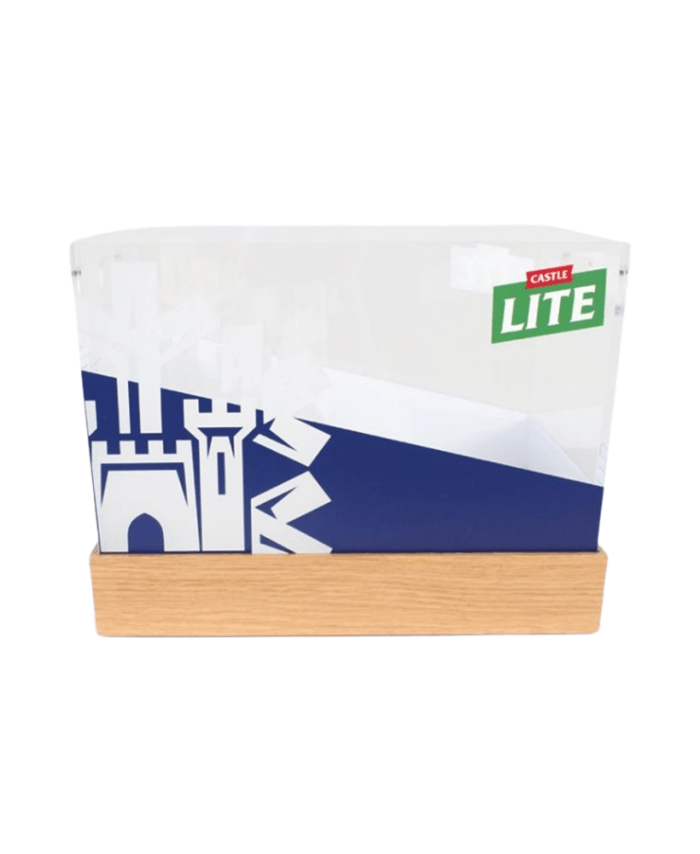 An LED Ice Bucket featuring the Castle Lite logo, a white and blue abstract design, and a stylish wooden base.