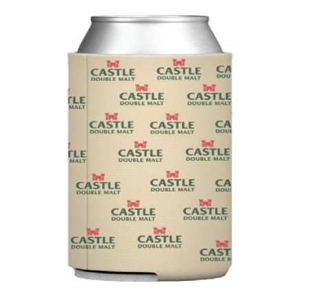 A silver can is wrapped in a beige Stubby Can Cooler featuring repeating red and green "Castle Double Malt" logos.